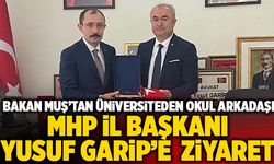 Bakan Muş’tan Üniversiteden Okul Arkadaşı MHP İl Başkanı Yusuf Garip’e Ziyaret