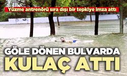Göle dönen bulvarda kulaç attı