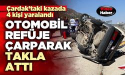 Otomobil refüje çarparak takla attı