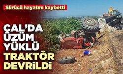 Çal’da üzüm yüklü traktör devrildi