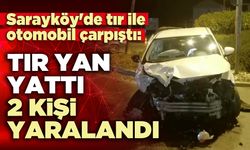 Sarayköy'de tır ile otomobil çarpıştı: Tır yan yattı, 2 kişi yaralandı