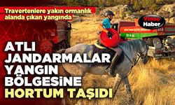 Atlı jandarmalar yangın bölgesine hortum taşıdı