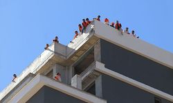 Çatıya çıkan işçiler ile firma arasında mutabakat sağlandı