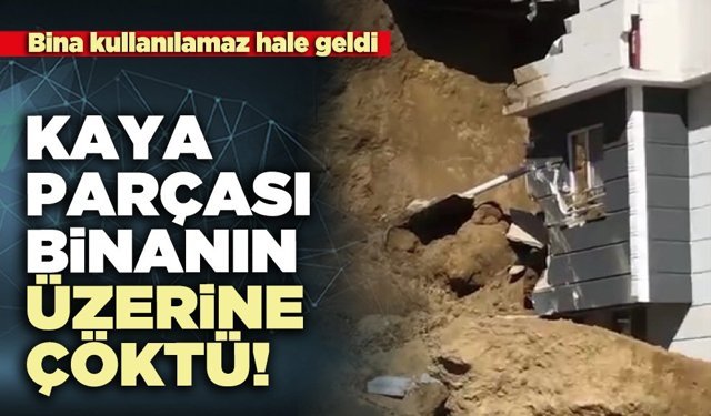 Kaya parçası binanın üzerine çöktü!