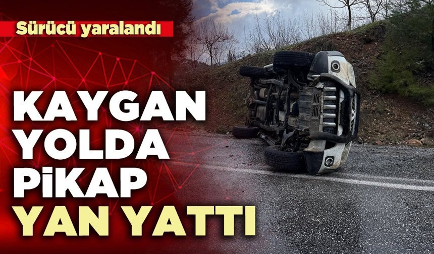 Kaygan yolda pikap yan yattı